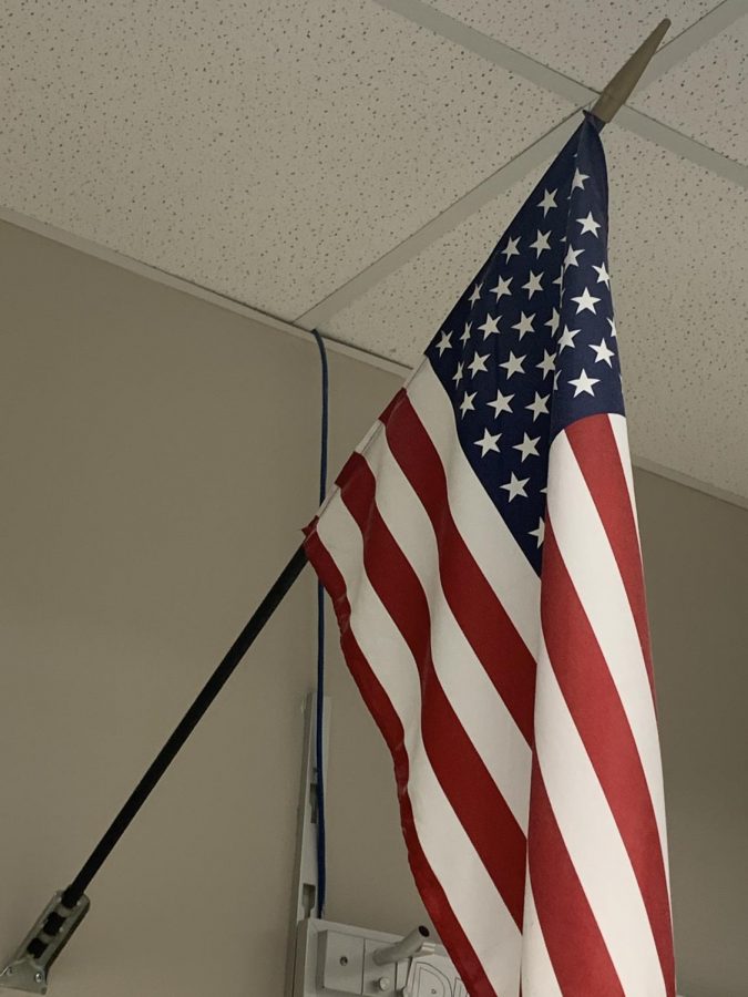 The+American+flag+stands+high+in+every+class+room.+This+is+a+reminder+we+live+in+a+free+country+and+no+matter+what+the+flag+will+fly+high.+%28Photo+by+Mitchell+Garcia%29.