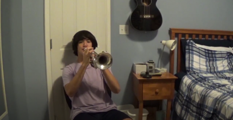 Tri-M student Jacob Park plays his trumpet for his performance.
