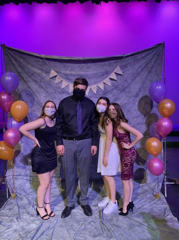 At the Theory of Relativity premiere, Encore! had a prom-style photoshoot. Here are the seniors from the cast. From left to right: Mikayla Blum, Caden Moe, Larina Pelletier, and Tori Whaples. Photo provided by Caden Moe