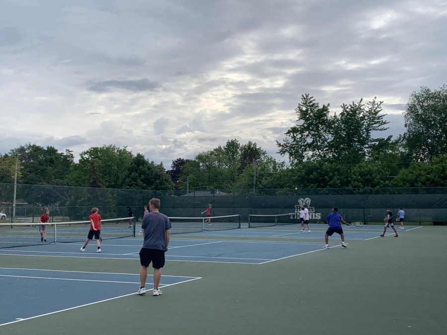 On May 25, 2021, GCHS junior varsity tennis players teamed up with varsity tennis to compete in a tournament during practice. Tennis athletes are not required to wear face masks during practice, but they still maintain social distancing.