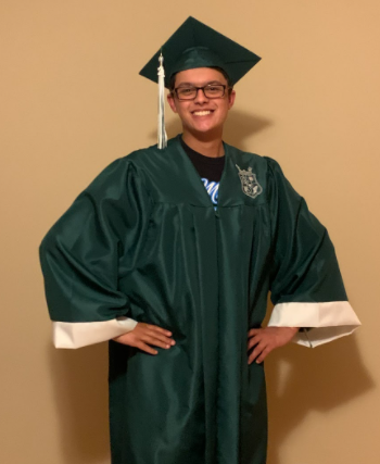 Senior Mitchell Garcia tries on his graduation gown in preparation for his big night on June 3 to say goodbye to high school for one last time.  These last events are giving seniors one last chance to say goodbye and walk down memory lane