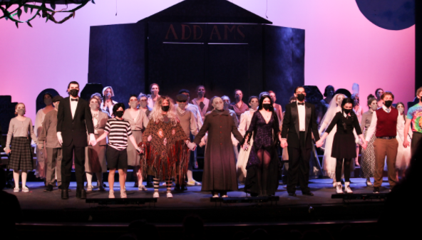 "The Addams Family" cast standing for the encore, photo by Michael Pigin