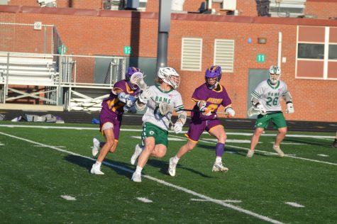 Senior Luke Butuvilas, midfielder for Grayslake Central, takes the ball down the field against Wauconda on April 12, 2023.
Photo provided by Daniel Laubhan