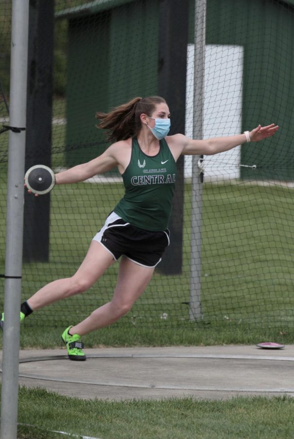 Julia Reglewski performing a discus throw. She set a new record with a throw of 138 feet and 2 inches.
