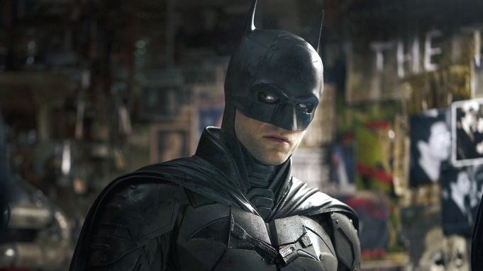 The+Batman+investigating+the+Riddlers+apartment%0A%28Photo+by+Warner+Bros.+Studios%29