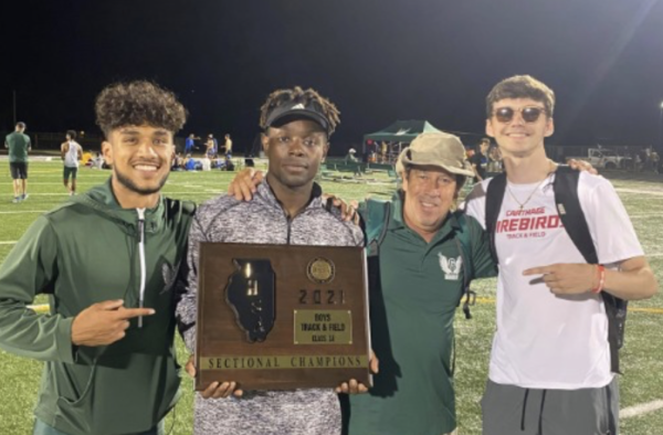Coach G with his runners at the 2021
Track & Field State Series