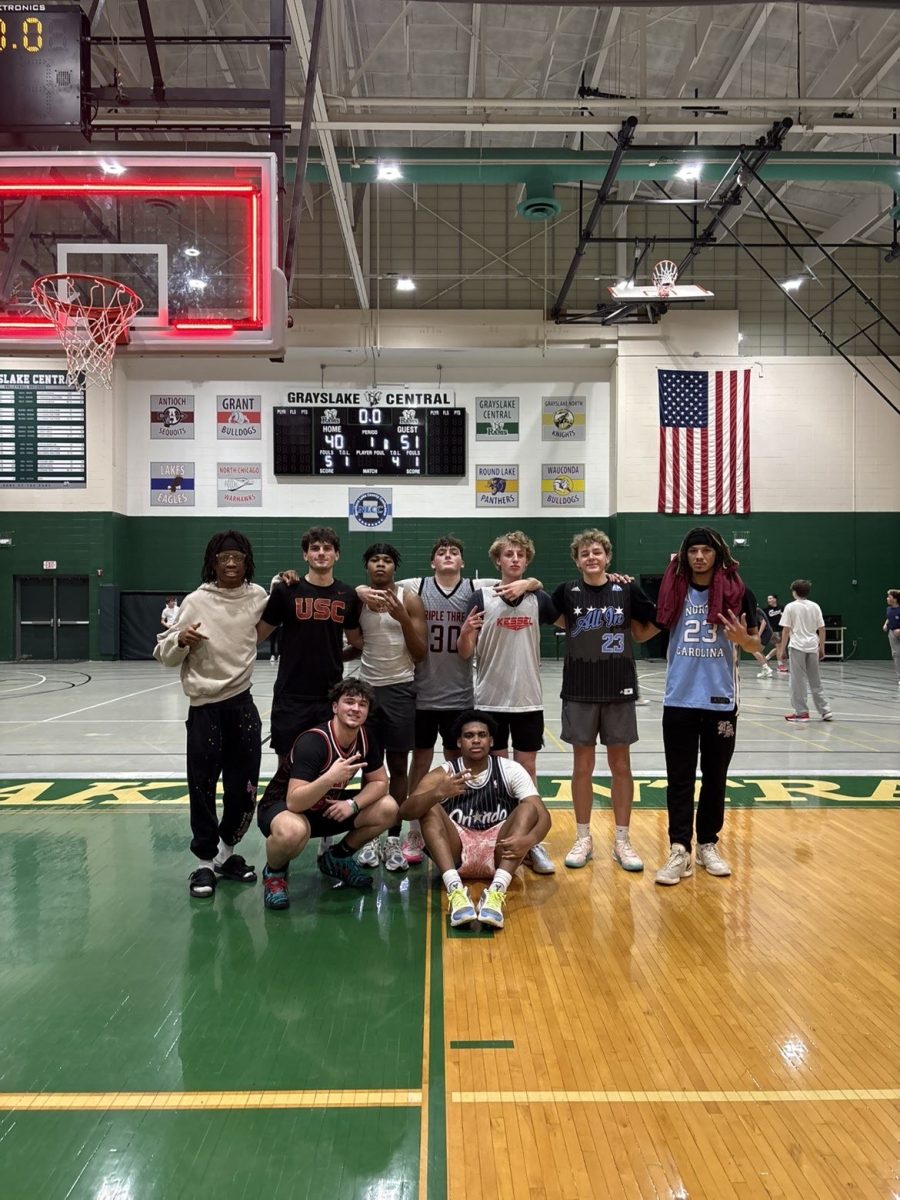 The intramural basketball program's team Chiraq Hoopers celebrate after their biggest win of the year.