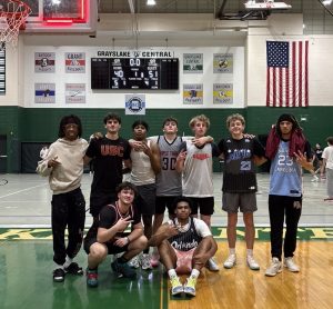 The intramural basketball program's team Chiraq Hoopers celebrate after their biggest win of the year.
