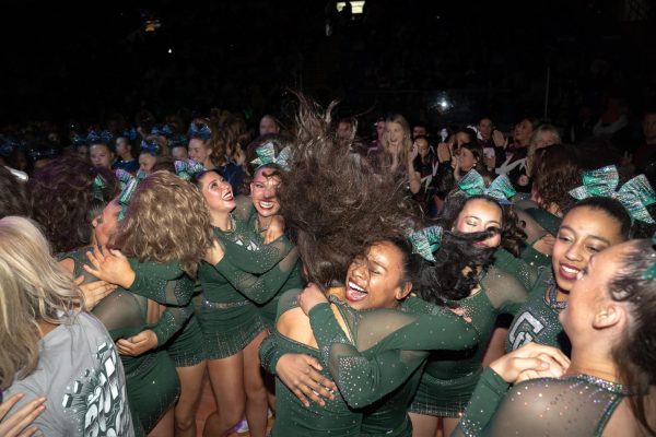 The GCHS varsity cheer team celebrates hearing they’ve won State Runner-Up at the IHSA State Series in Bloomington, IL on Feb 7, 2026.  