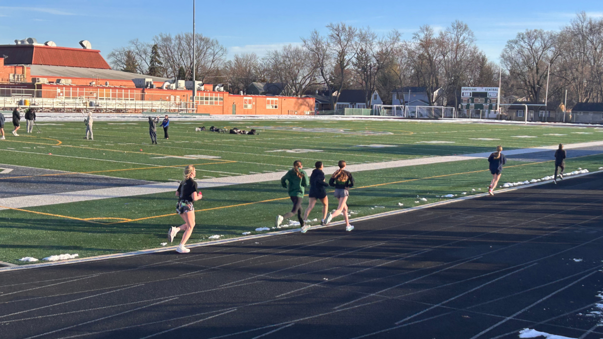 The track team made the most of the warmer weather on Feb. 11, 2026 when they practiced outside on the track.
 Photos by Nina Cavender