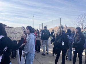 After first block on Feb. 9th, students used their student ID cards to "scan out" of the school and gathered outside of the Fieldhouse doors for the walkout.