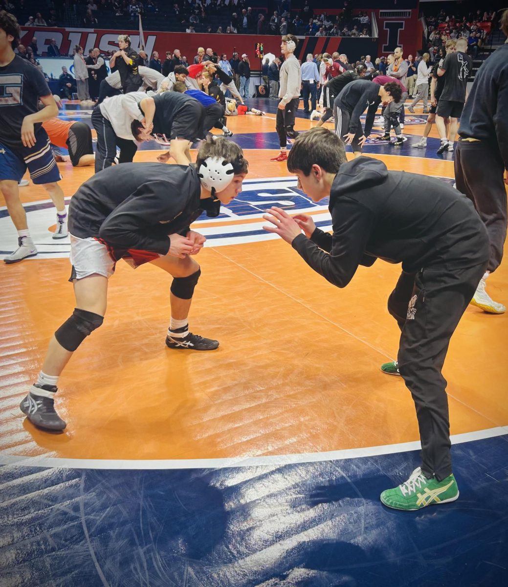 Both DeMarco brothers practice wrestling before state match